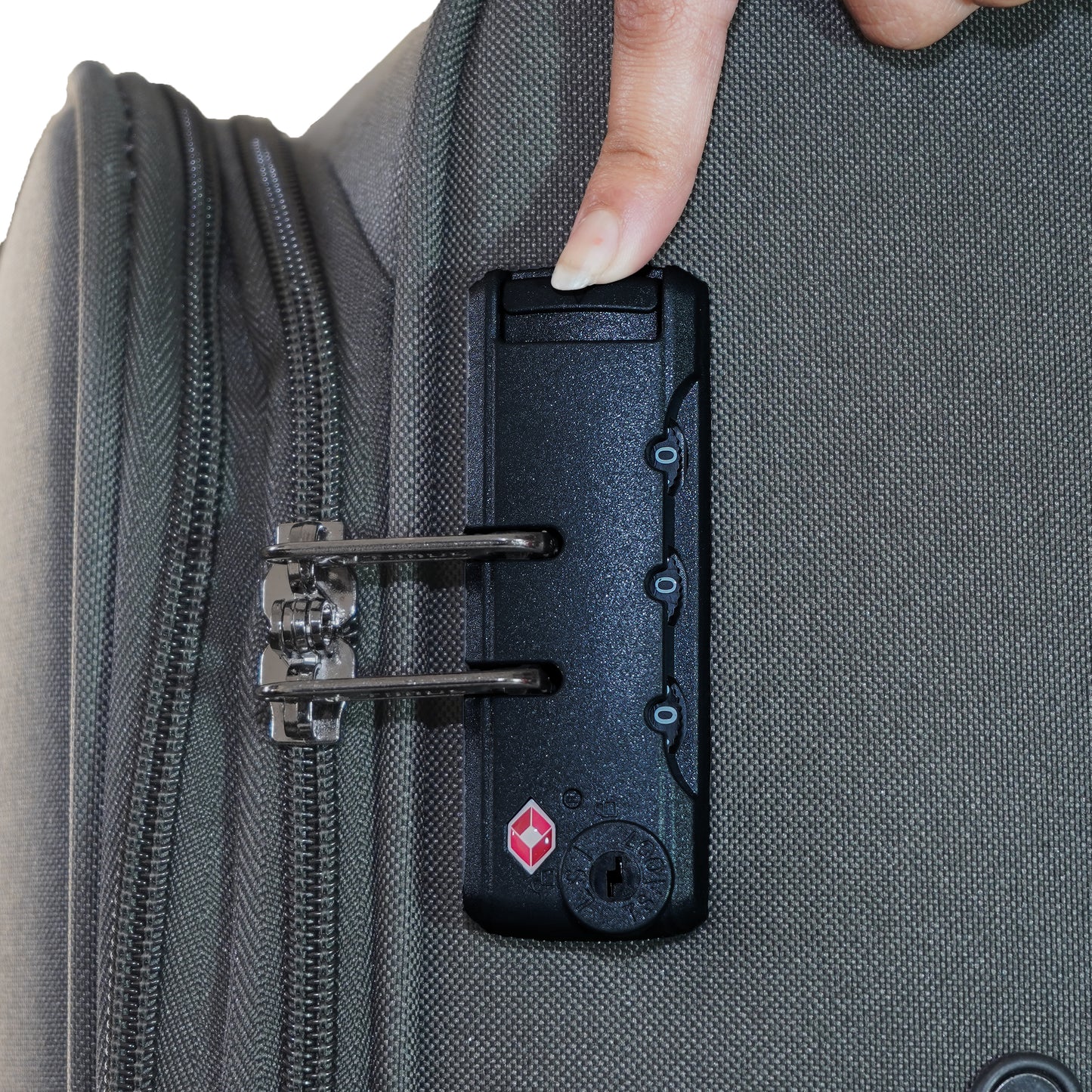 Close-up of the grey Flash Plus luggage showing a secure TSA lock