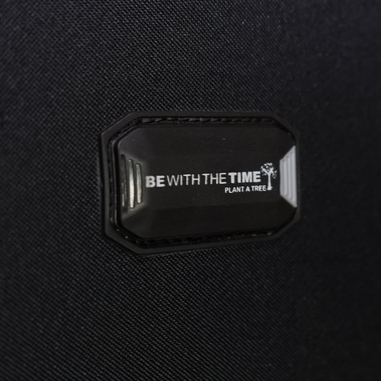 Name tag holder on black Flash Plus luggage