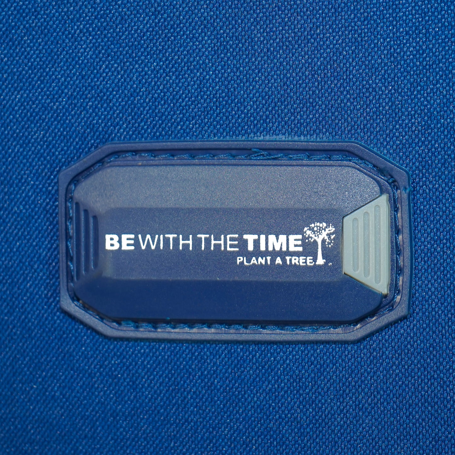 Built-in name tag holder on blue Flash Plus soft luggage for easy identification