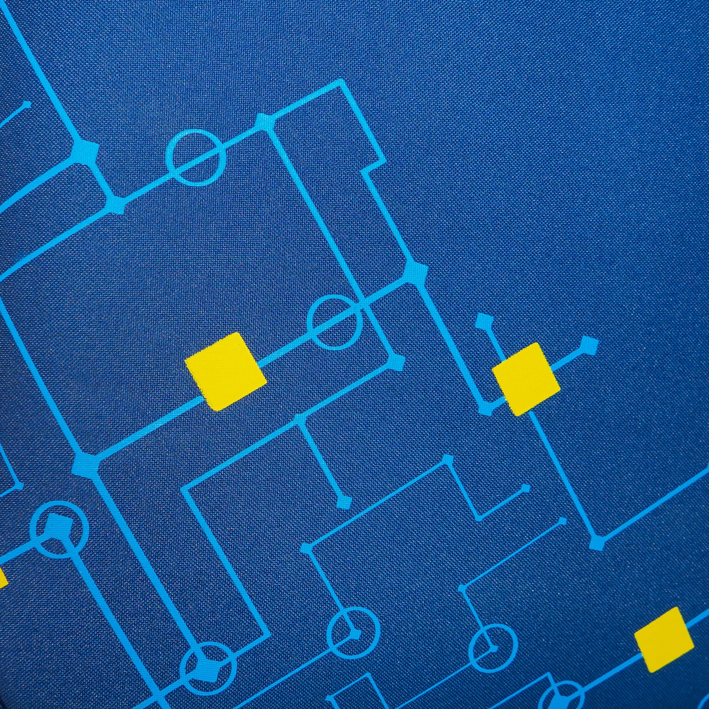 Close-up of printed pattern design on Flash Plus blue soft luggage