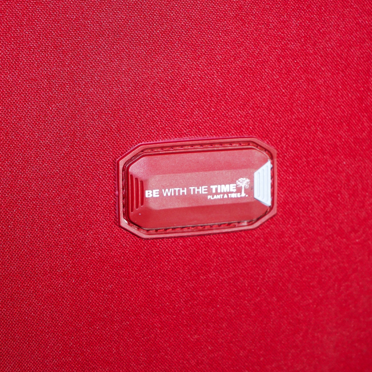 Built-in name tag holder on red Flash Plus soft luggage for personal identification