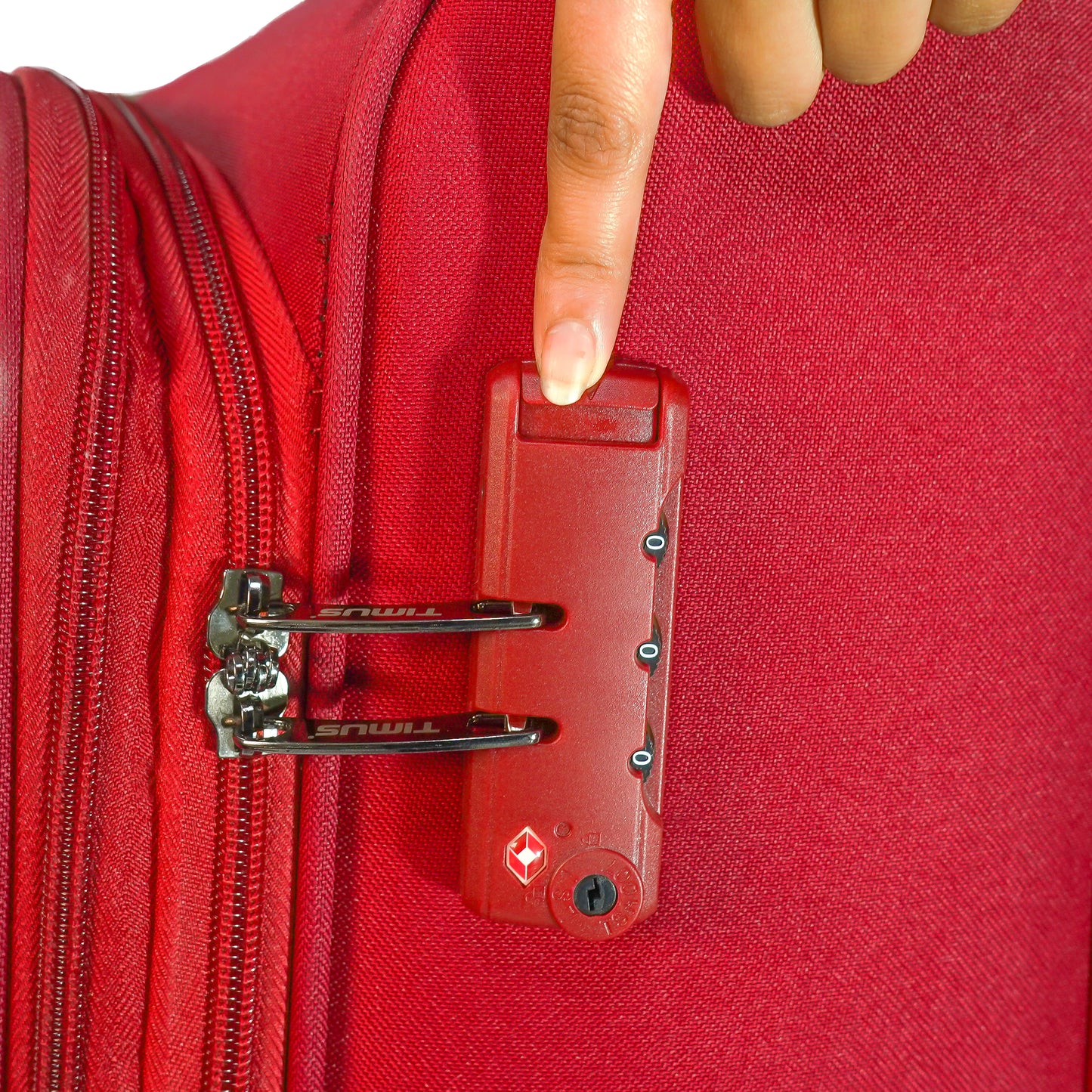 Close-up of TSA-approved lock on red Flash Plus soft luggage
