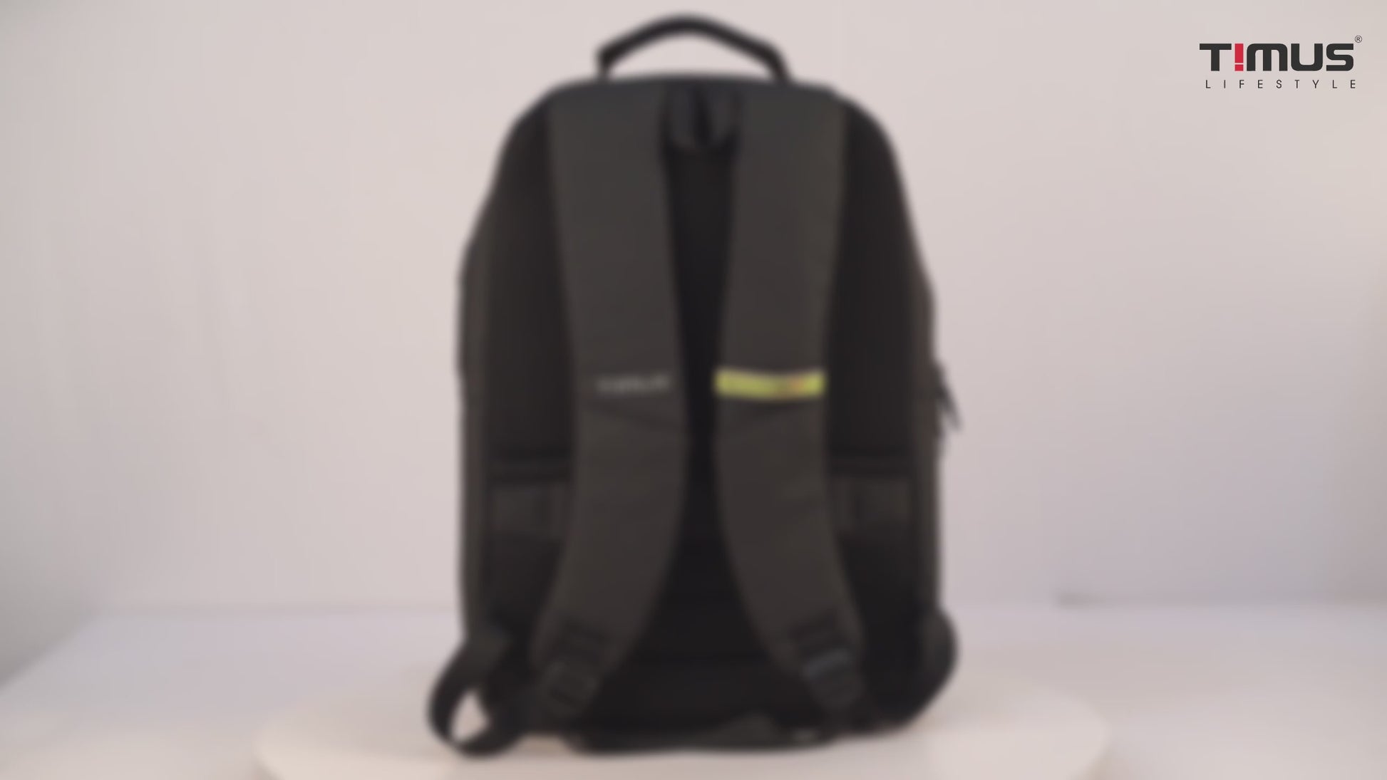 Timus Berlin backpack video showing spacious interior with multiple compartments, organized packing of laptop, charger, notebook, and travel essentials.