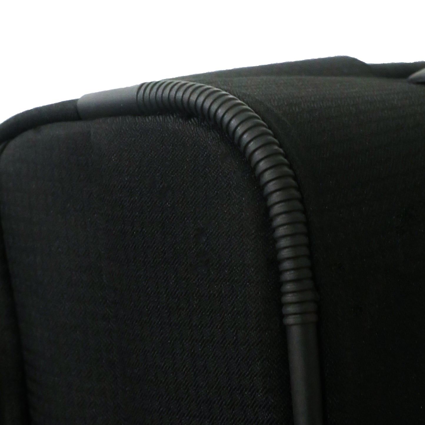 Close-up of the protective corner guard detailing on Salsa Plus black luggage, designed to prevent wear and tear during travel.