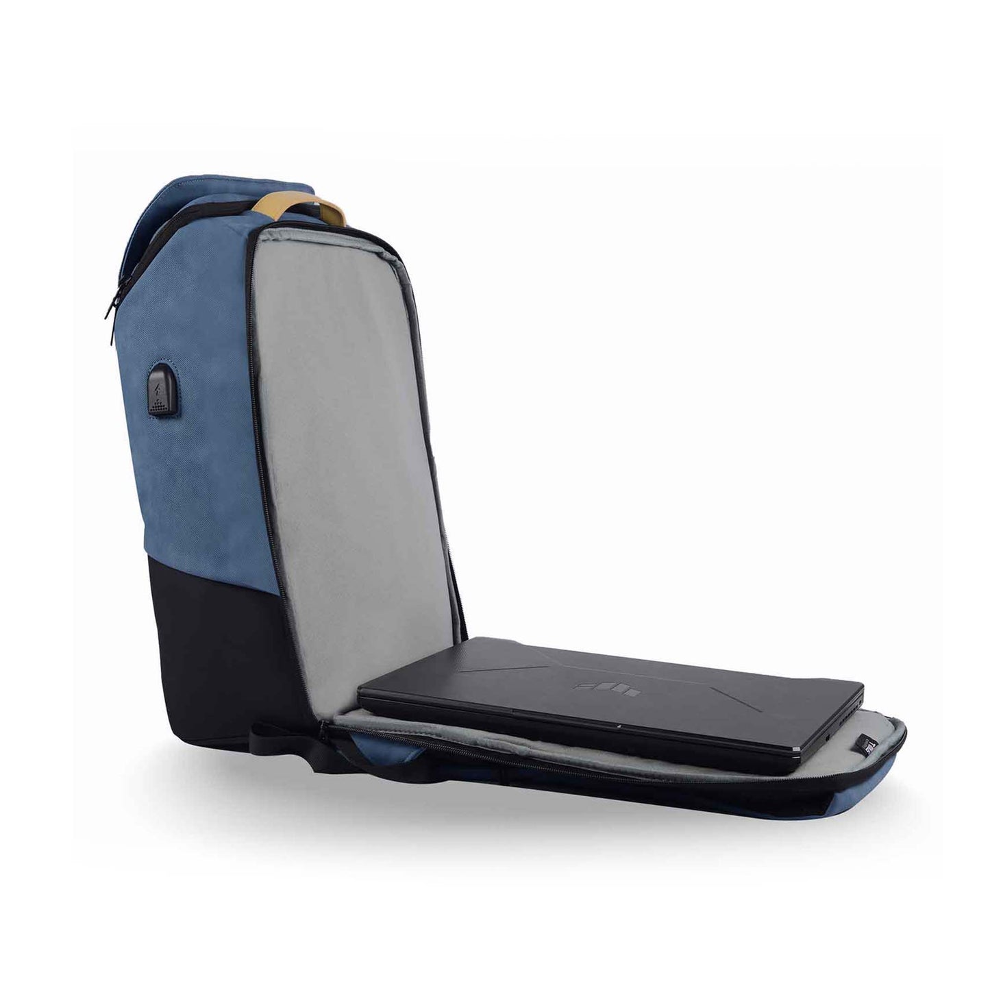 Side view of the Timus Magnet Overnighter backpack in blue, open to show laptop compartment with a laptop inside.