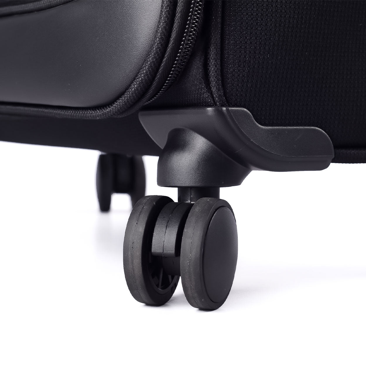 Close-up view of dual 360-degree spinner wheels on the Timus Atlanta Pro Overnighter black business travel bag, highlighting durable construction and smooth mobility.