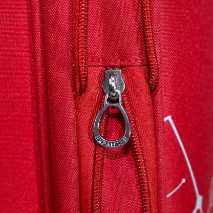 Expandable zipper on red Flash Plus soft luggage for extra packing space