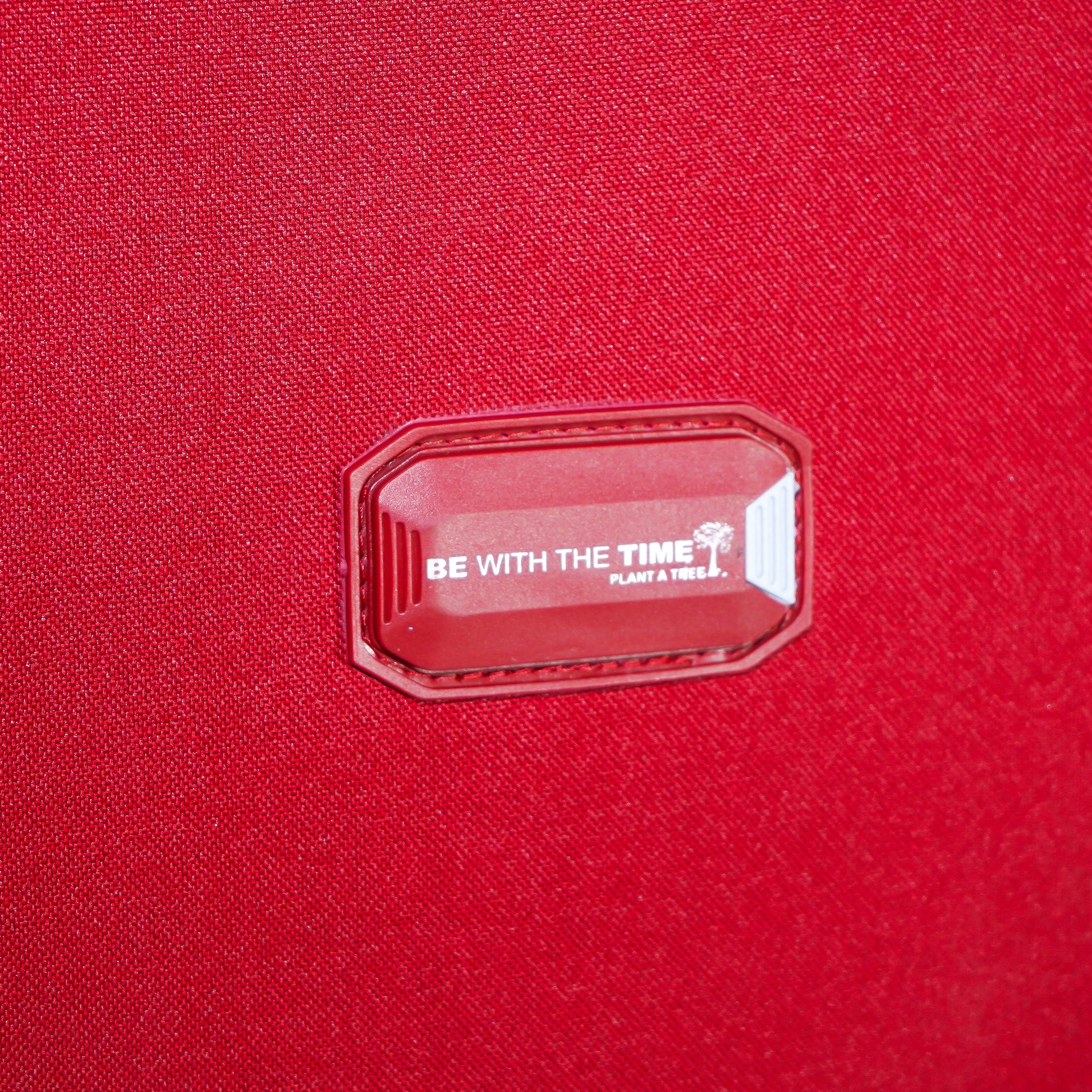 Built-in name tag holder on red Flash Plus soft luggage for personal identification