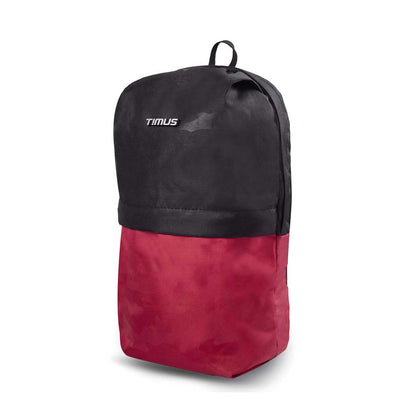 Left side front angled view of Timus Atomic Mini Backpack in grey and red colour.