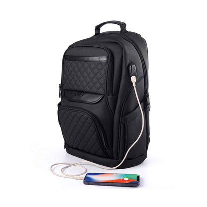 Berlin black professional laptop backpack with quilted front panel and built-in USB charging port, shown from left front angle.