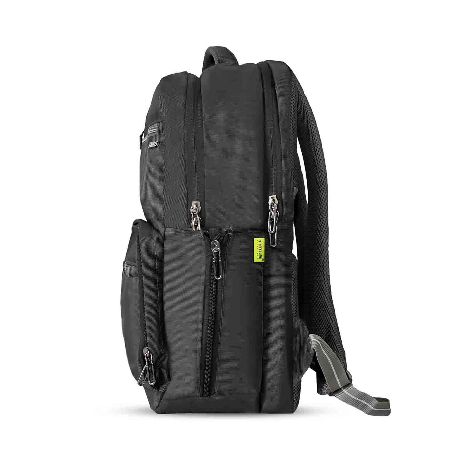 Left side view of black Timus Canada casual backpack featuring a textured finish, padded shoulder strap with grey adjustable buckle, side zippered pocket with timus brand tag and multiple zippered compartments visible.
