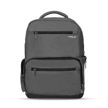 Front view of grey Timus Canada backpack with zippered front compartments, padded top handle, side pockets, and visible Timus logo.
