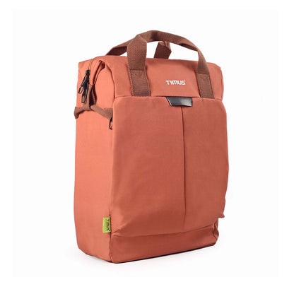 Right side angled view of rust Timus Chicago urban backpack with brown handles, closed zippers and visible front pocket.