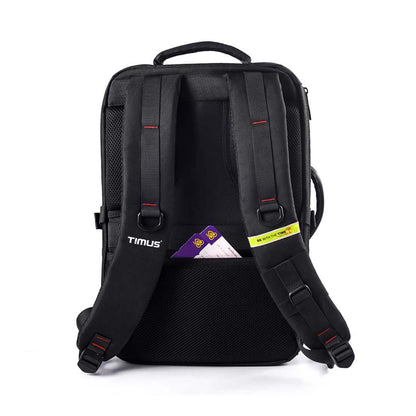 Back side view of London laptop backpack by TIMUS showing padded shoulder straps with TIMUS logo, handle, and a mesh pocket holding a cards. Yellow tag on strap reads 'BE WITH THE TIME'.