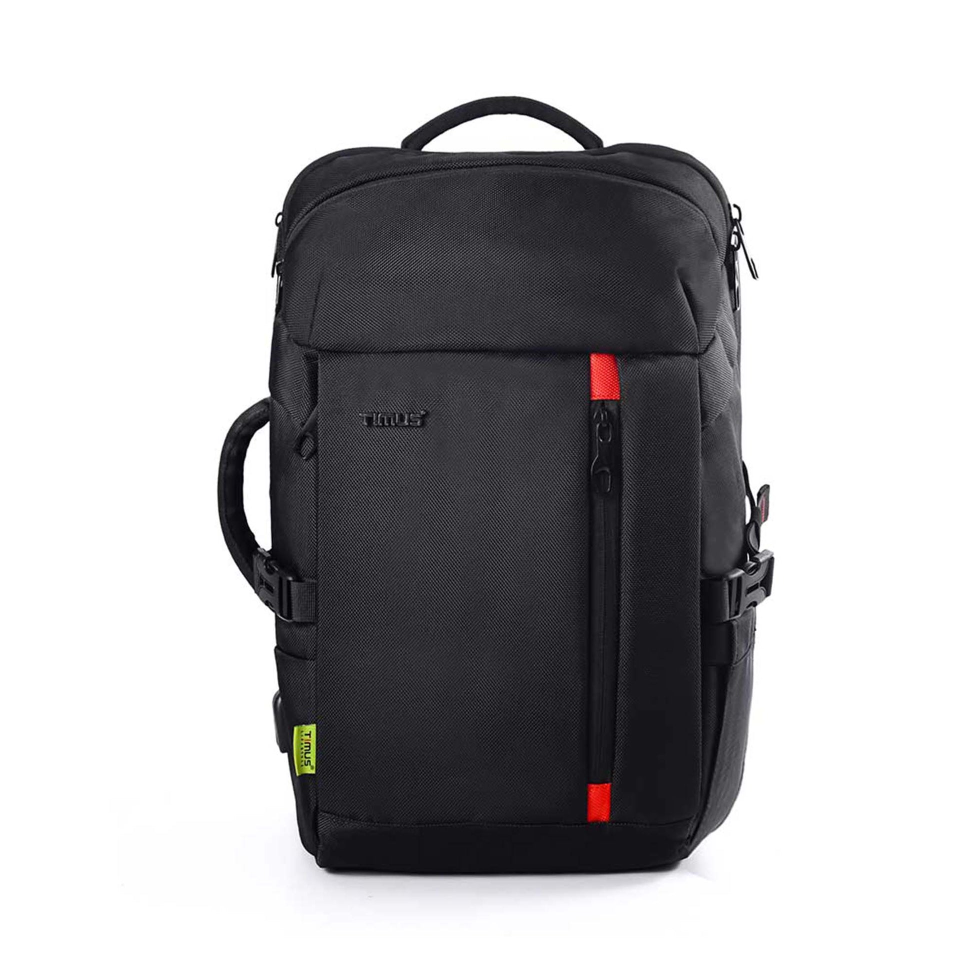 Front side view of black London laptop backpack by TIMUS featuring the TIMUS logo, red zipper accents, padded side handle, and sturdy top carry handle.