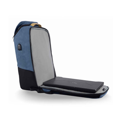 Side view of the Timus Magnet Overnighter backpack in blue, open to show laptop compartment with a laptop inside.

