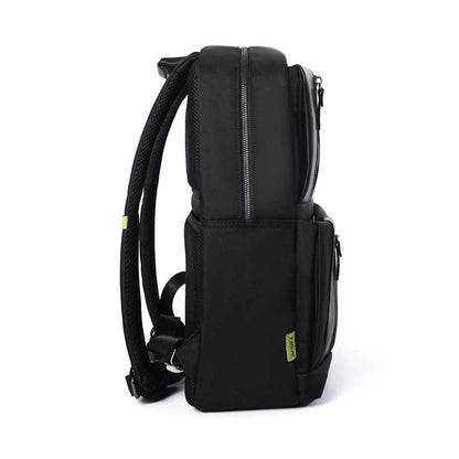 Right side view of Timus Oslo black professional laptop backpack showing depth, shoulder straps, and visible green Timus label on side pocket.