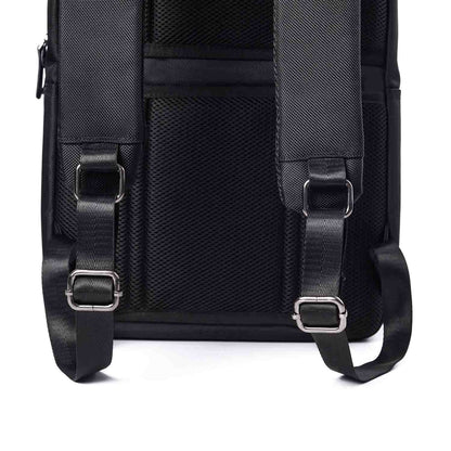 Close-up view of Timus Oslo black professional laptop backpack showing adjustable padded shoulder straps, metal buckles, and breathable mesh back panel texture.