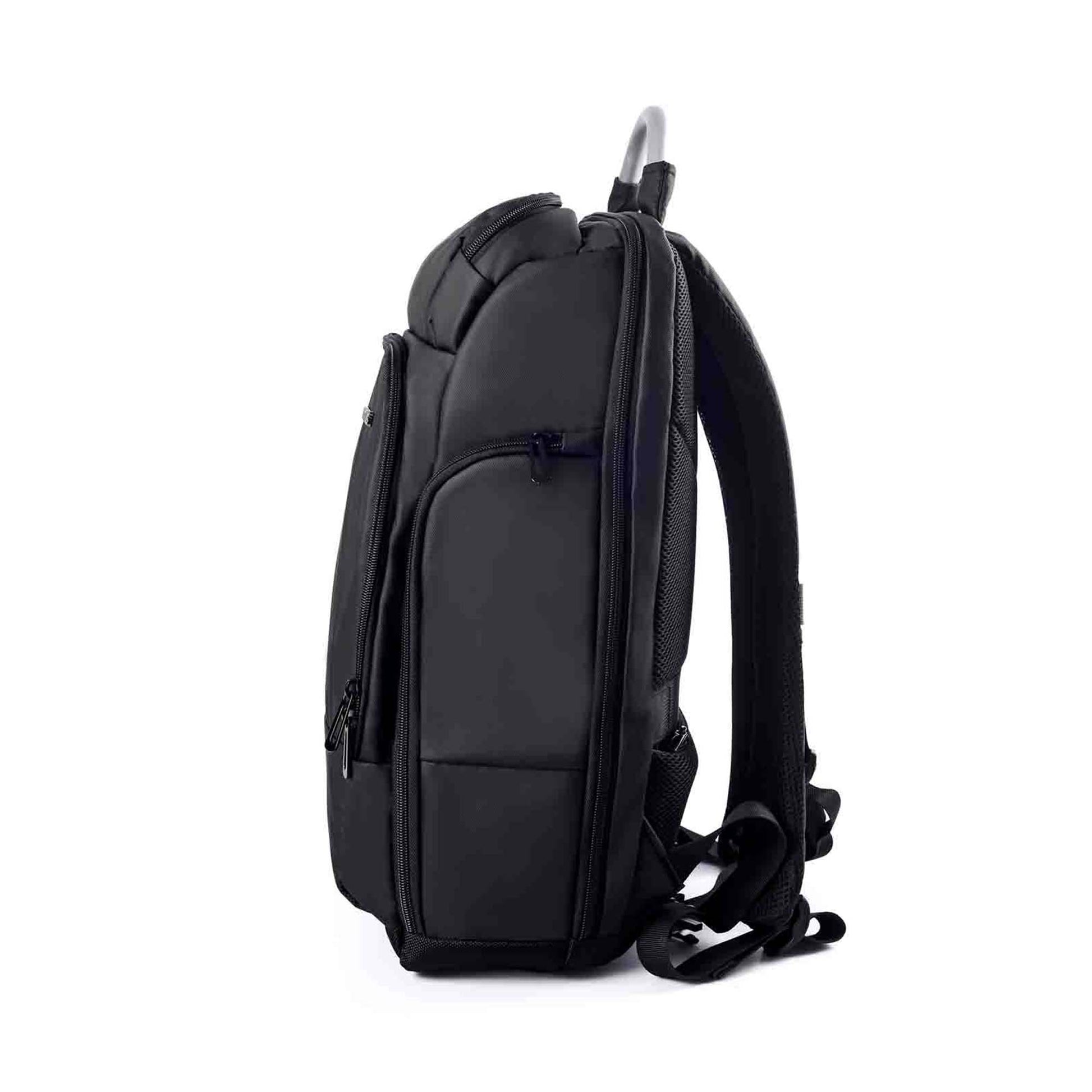 Left side view of a black Timus Seattle laptop backpack showing zippered side pockets and padded shoulder straps with a silver metal handle on top.