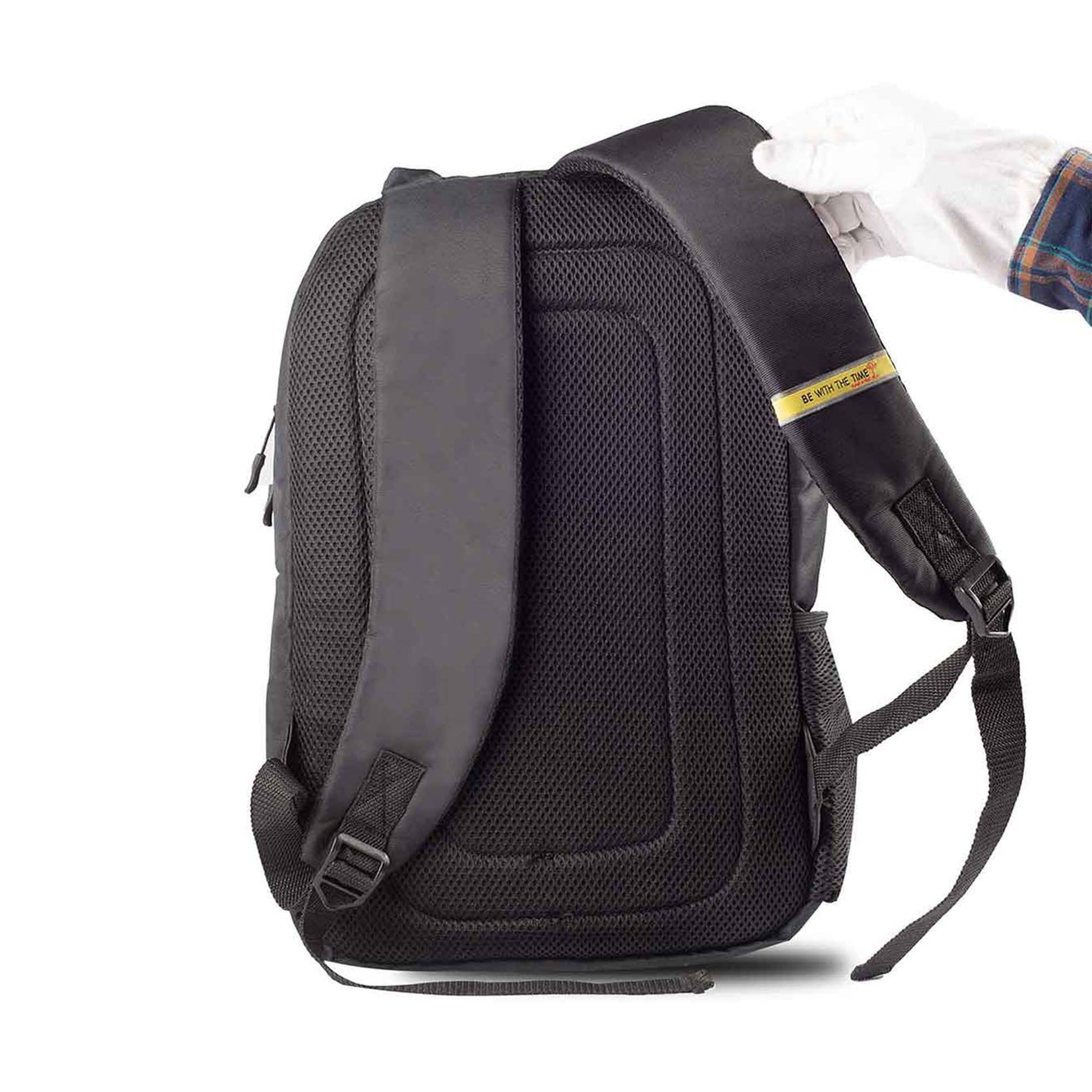 Back view of Timus Spain casual backpack showing padded back panel and adjustable shoulder straps, with a gloved hand holding one strap.